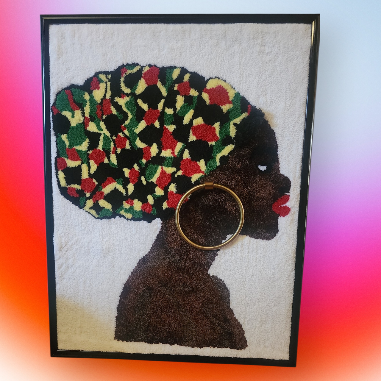 African Queen with large earrings in a picture frame